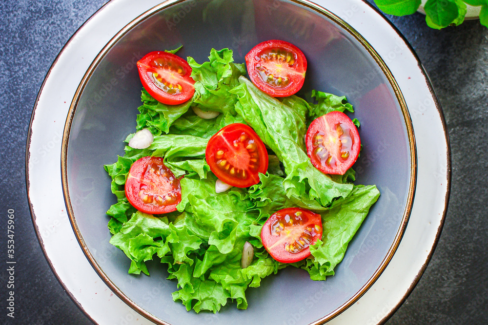 salad vegetables, lettuce and tomato Menu concept. food background top view copy space for text healthy eating keto or paleo diet organic salad vegetables, lettuce and tomato Menu concept. food background top view copy space for text healthy eating keto or paleo diet organic