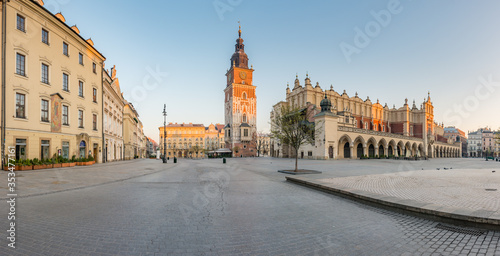 Krakow, Poland, Cloth Hall and Town Hall tower on the Main Square in the morning