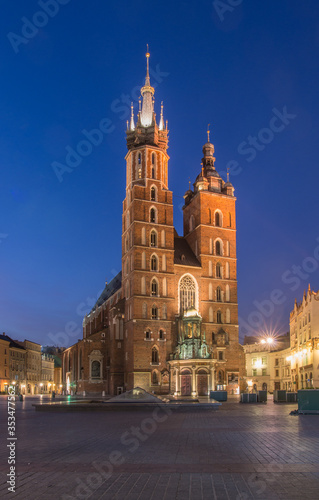 Main market square  St Mary s church in the night  Krakow  Poland