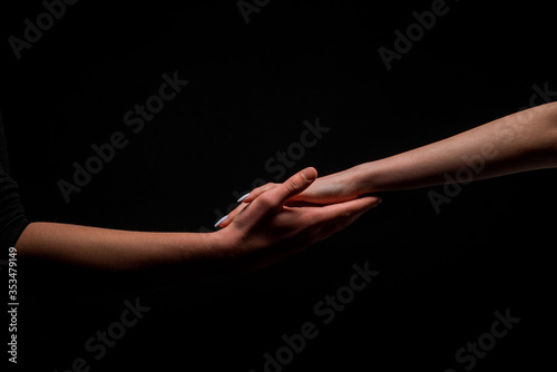 Hands touching each other