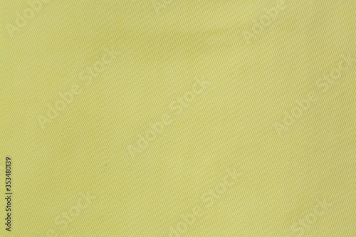 Light yellow plain fabric, drapery, background, close-up