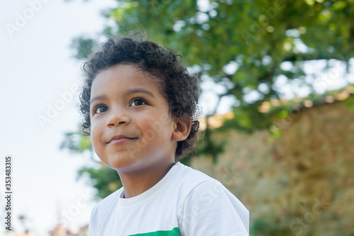 African boy close up in nature.