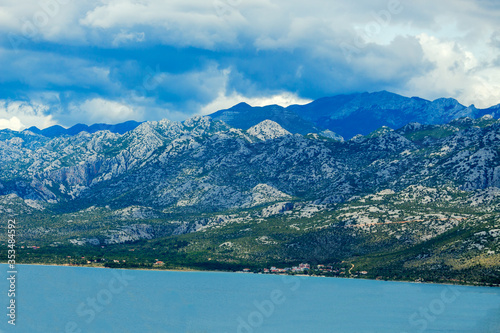 Breathtaking view of the village in the Boko Kotor Bay of the Rocky Mountains and the Adriatic Sea of Montenegro  soft focus