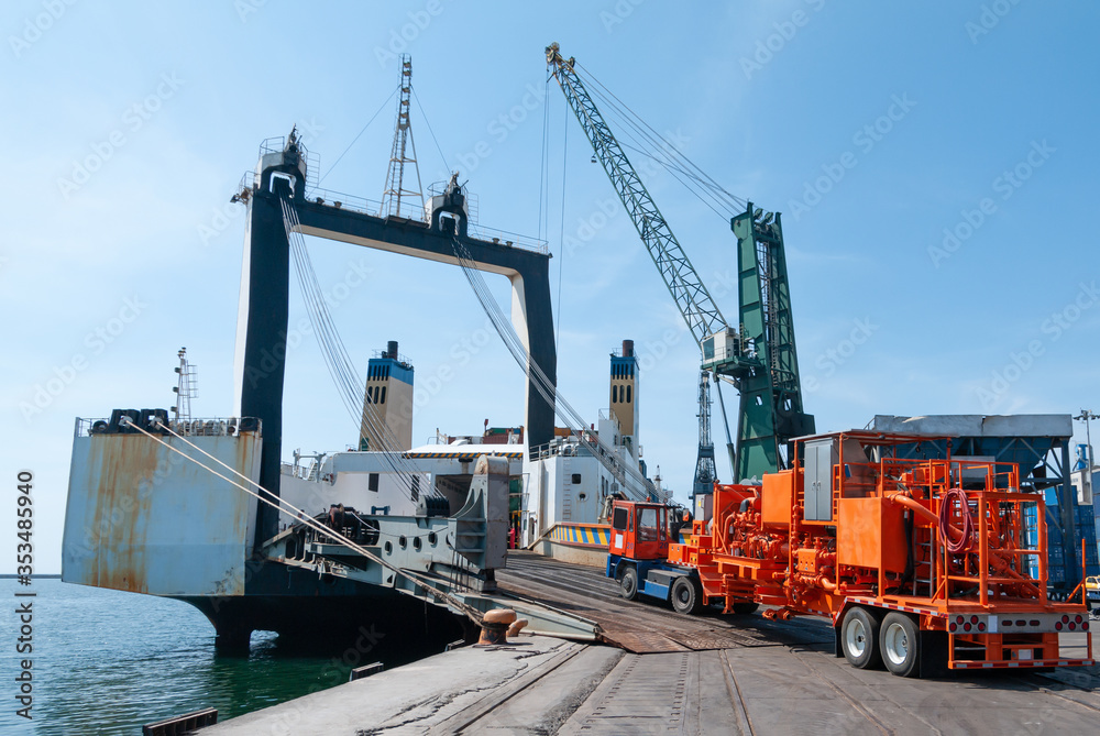 Obraz premium Loading on Ro-Ro Cargo Ship (Roll-on/Roll-off)