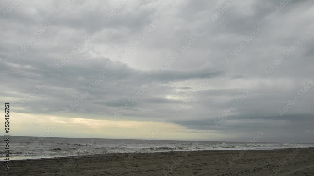 Timelapse of storm clouds over mostly vacant beach. Myrtle Beach, South Carolina Timelapse of storm clouds over mostly vacant beach. Myrtle Beach, South Carolina
