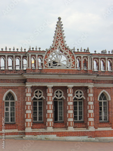 Moscow / Russia – 07 16 2019: 2nd Cavalier house facade fragment close up exterior outside view in Tsaritsyno Park Museum on summer day, architecture ancient landmark