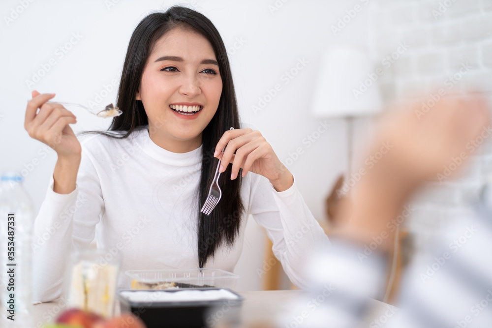 Beauty Young Asian woman eating lunchbox set with friend. Beauty Young Asian woman eating lunchbox set with friend.