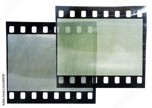 two scratched and empty 35mm film strips on white background overlapping each other, cool poster idea or blank photoplaceholder, just add your content
 photo