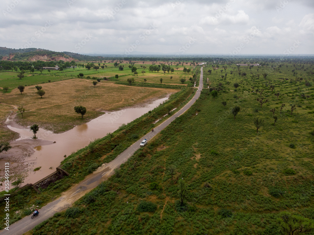 Aerial view of green agricultural fields. Taken by a drone