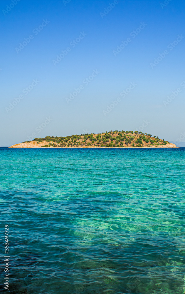 empty tropic island scenic view without people in popular and famous summer vacation destination site of Greece Mediterranean landscape environment concept picture in vertical format