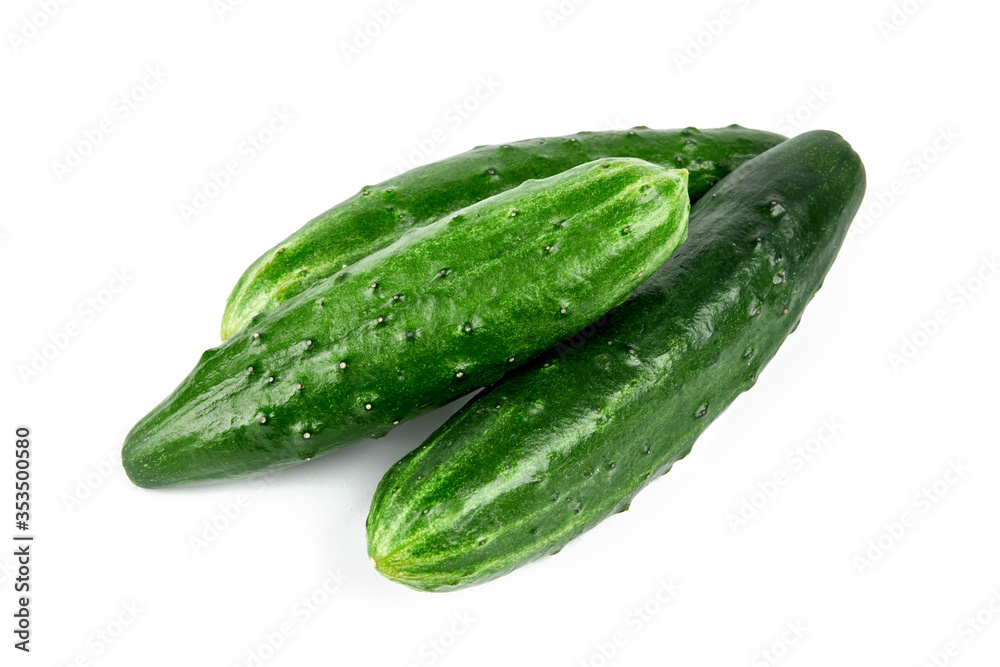 group of a fresh tasty cucumbers isolated on white background. group of a fresh tasty cucumbers isolated on white background.