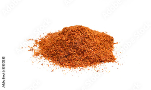 Red pepper powder isolated on white background. Dry and grinded