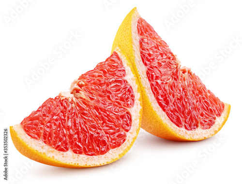 Two slices of grapefruit citrus fruit isolated on white background with clipping path. Full depth of field.