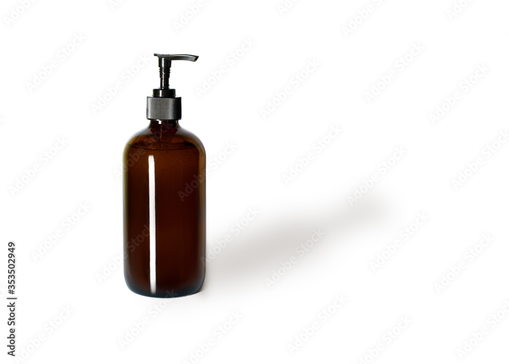 dark brown cosmetic bottle on white background isolated