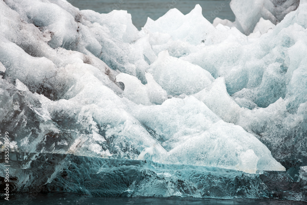 Melting iceberg closeup of texture and pattern Melting iceberg closeup of texture and pattern
