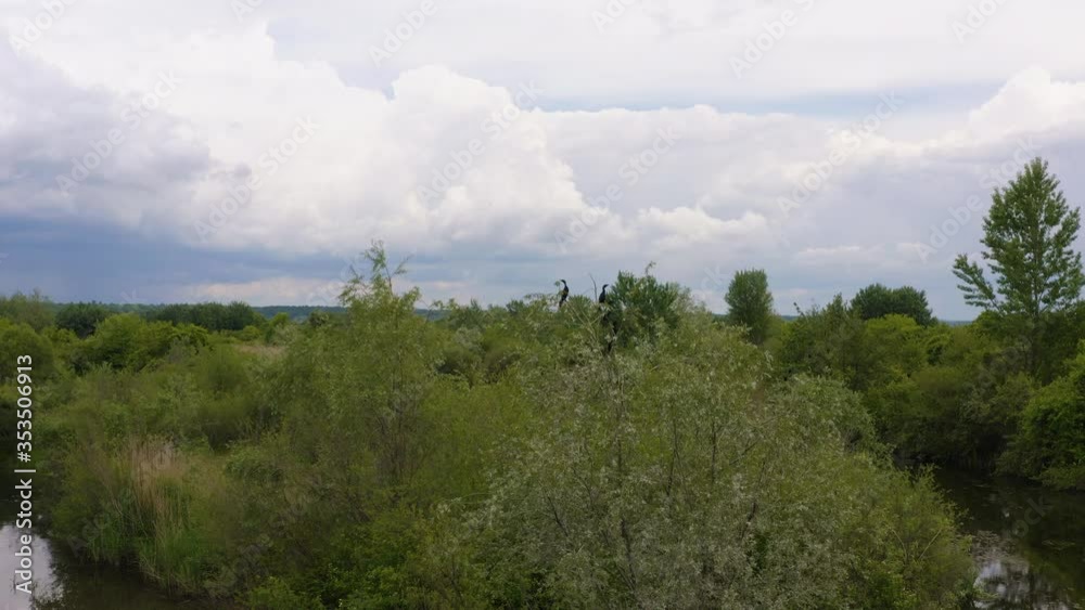 Flying Over Lake And Island. River With Ripples. Aerial Drone Shot. Water Flying Over Lake And Island. River With Ripples. Aerial Drone Shot. Water