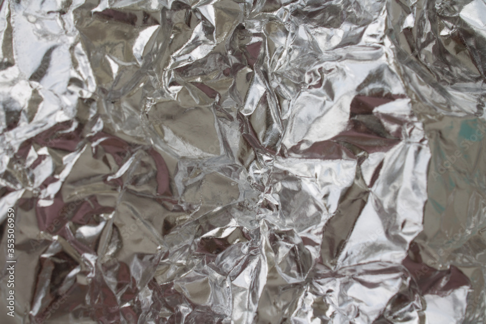 Abstract background with metallic broken reflection effect. black and white monochrome silver foil backdrop for your design. Macro shooting Abstract background with metallic broken reflection effect. black and white monochrome silver foil backdrop for your design. Macro shooting