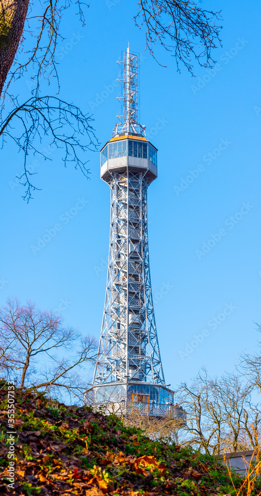 Petrin Tower. Detailed view on sunny day with blue sky background. Prague, Czech Republic Petrin Tower. Detailed view on sunny day with blue sky background. Prague, Czech Republic