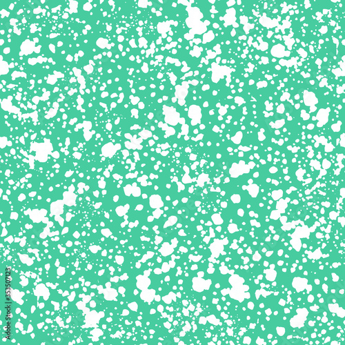 Hand drawn paint splatter texture, vector seamless pattern. White spots on a turquoise background. Vector illustration. White blot pattern