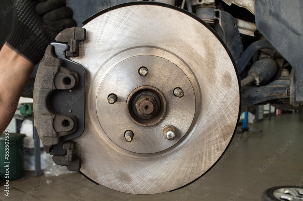 New brake pads and discs installed on the car