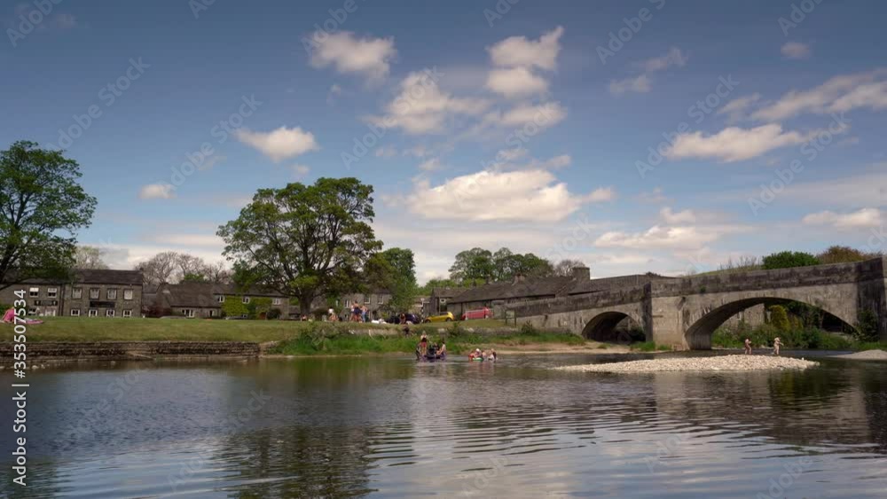View of Burnsall, and its well known bridge in Wharfedale, Yorkshire Dales National Park, North Yorkshire, England, Britain, View of Burnsall, and its well known bridge in Wharfedale, Yorkshire Dales National Park, North Yorkshire, England, Britain,
