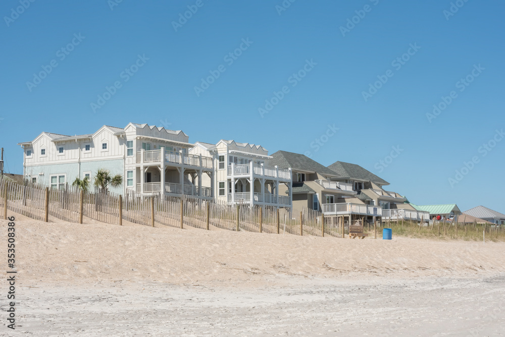 Oceanfront property along the shore of a nearly deserted Wrightsville Beach