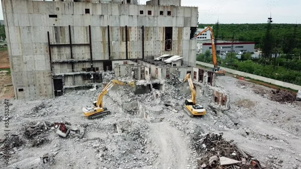 Aerial view of demolition site. Process of demolition of old industrial building
