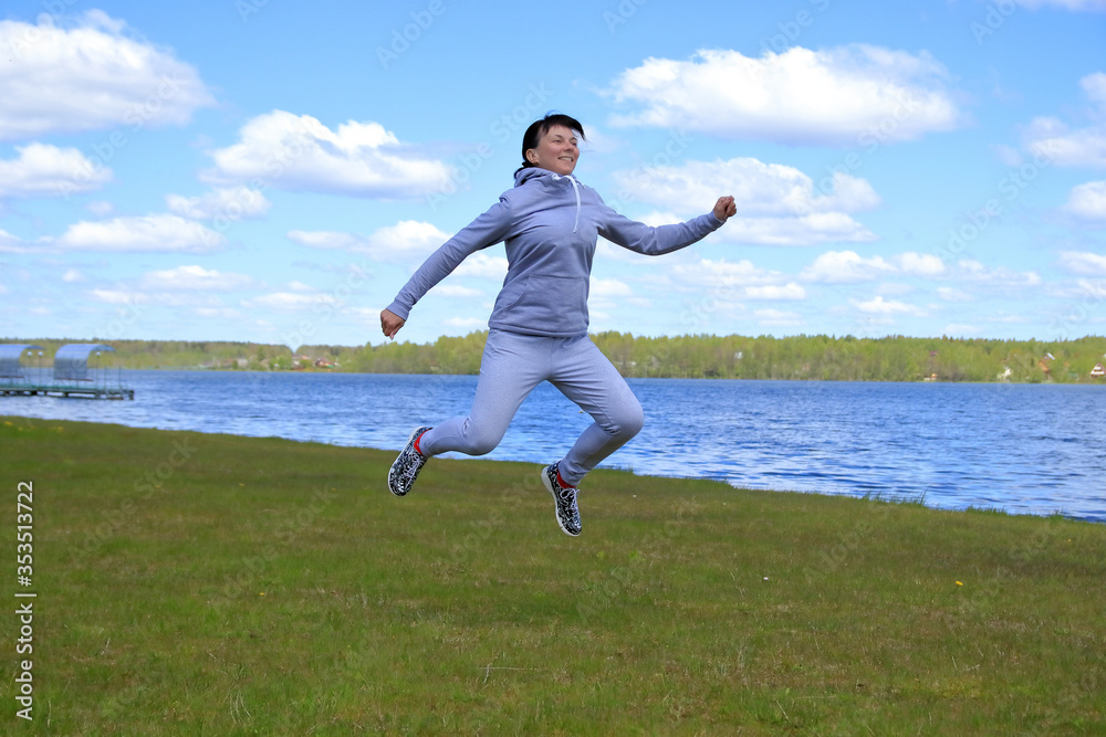athletic woman is training in nature athletic woman is training in nature
