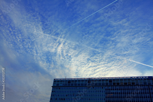 part of building and low clouds in the evening