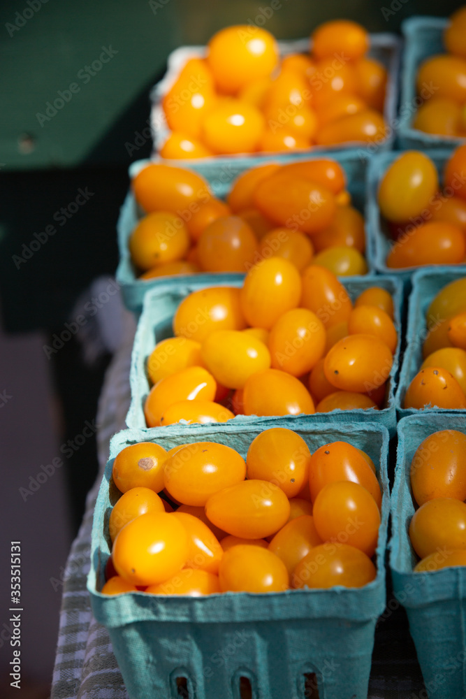 Orange cherry tomatoes, like many cherry tomato varieties, are smaller and sweeter than large tomatoes, however they are distinguished by their orange complexion, resulting from a mutation. The recess