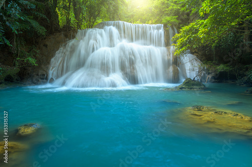 Beautiful deep forest waterfall at Kanchanaburi province, Thailand. © yotrakbutda