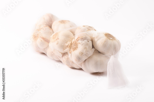 A clove of garlic on white background