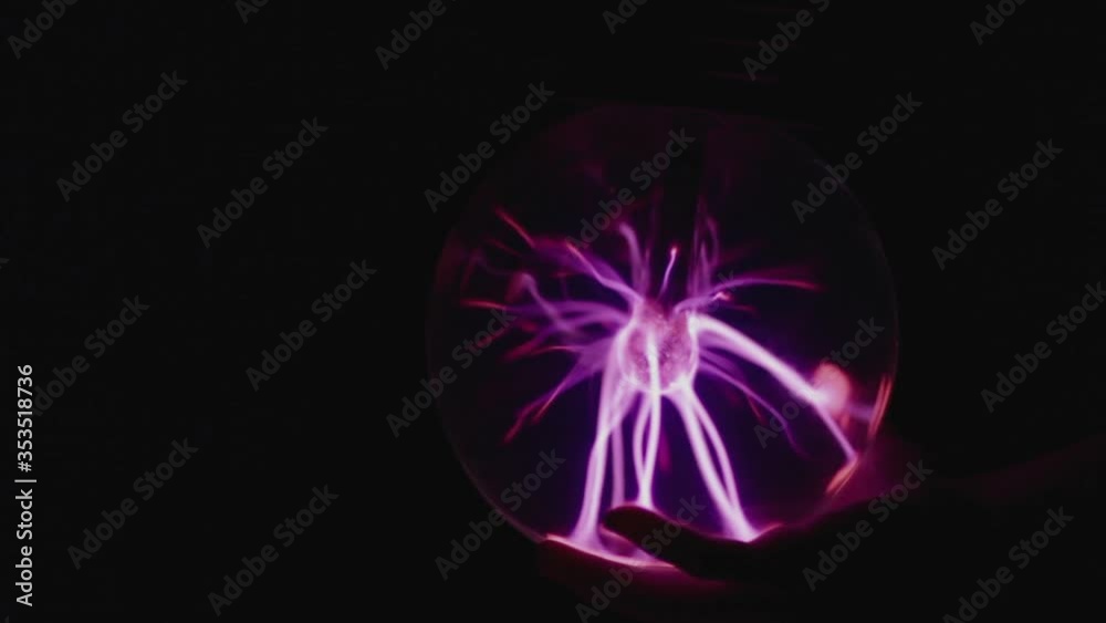 Glowing plasma ball with neon illumination Glowing plasma ball with neon illumination