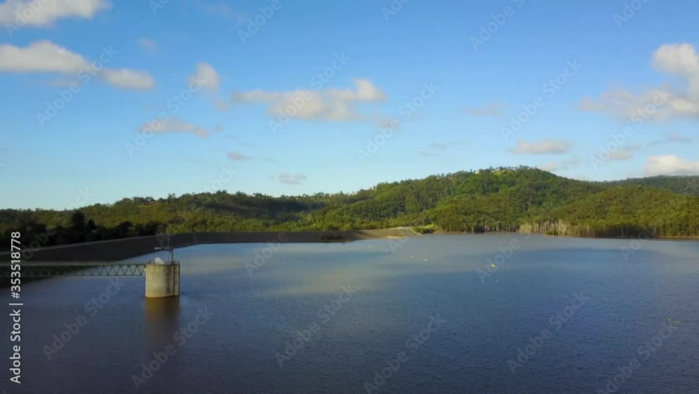 Aerial Drone Over Large Blue Hinze Dam Water Reservoir Near Green Mountains In Australia Aerial Drone Over Large Blue Hinze Dam Water Reservoir Near Green Mountains In Australia