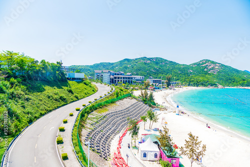 A coastal winding mountain road in the orange fishing sand of Yangmeikeng, Dapeng New District, Shenzhen, Guangdong, China
 photo