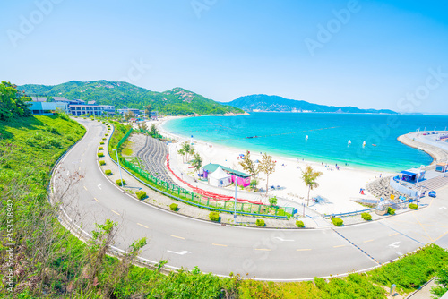 A coastal winding mountain road in the orange fishing sand of Yangmeikeng, Dapeng New District, Shenzhen, Guangdong, China
 photo