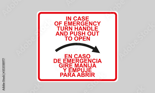 Decal in case of emergency turn handle and push out to open, two idioms spanish and english