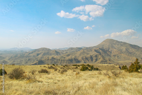 mountain landscape with blue sky and clouds