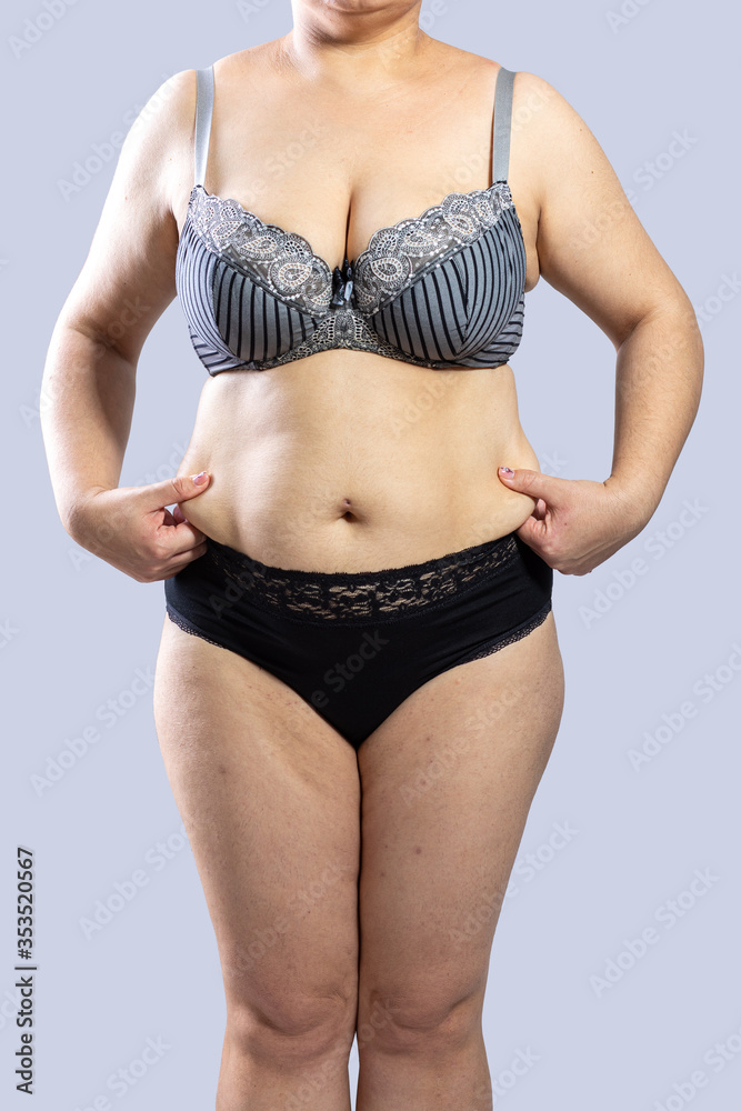 Real Body Plus Size Model Woman in lingerie Stock Photo