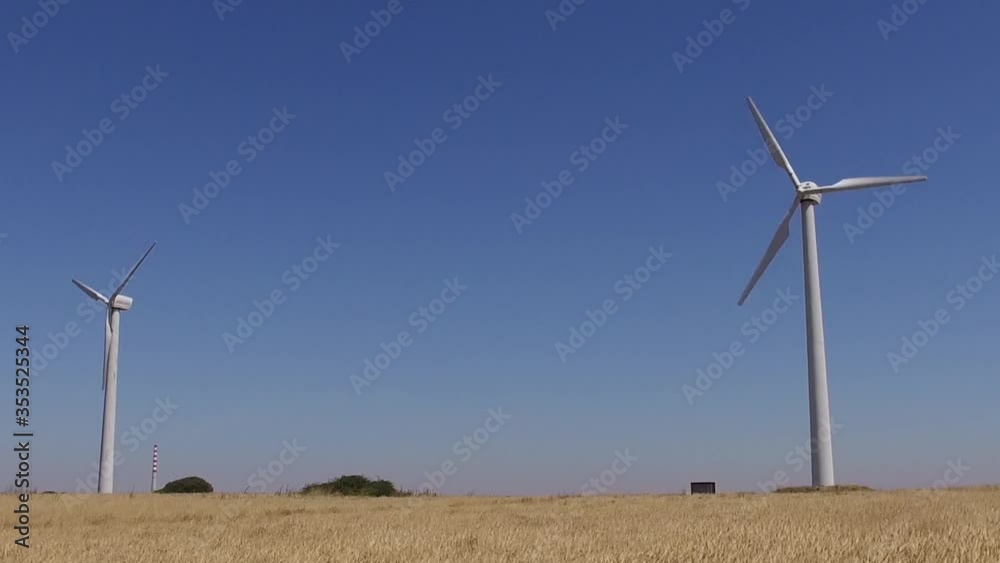 wheat field with eolic turbines wind renewable energy farm wheat field with eolic turbines wind renewable energy farm