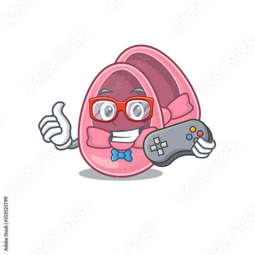 Mascot design style of baby girl shoes gamer playing with controller
