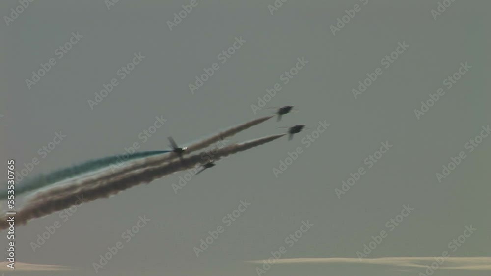 Air display in airshow with jet planes and smoke red, white and blue Air display in airshow with jet planes and smoke red, white and blue