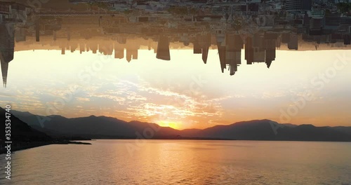 4k drone footage of two contrast ideas of nature and urban city life.
