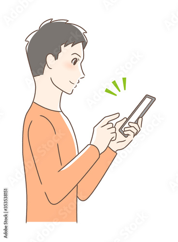 スマホを操作して笑顔な男性の横顔