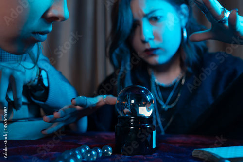 Bilde på lerret Woman and woman fortune teller with crystal ball