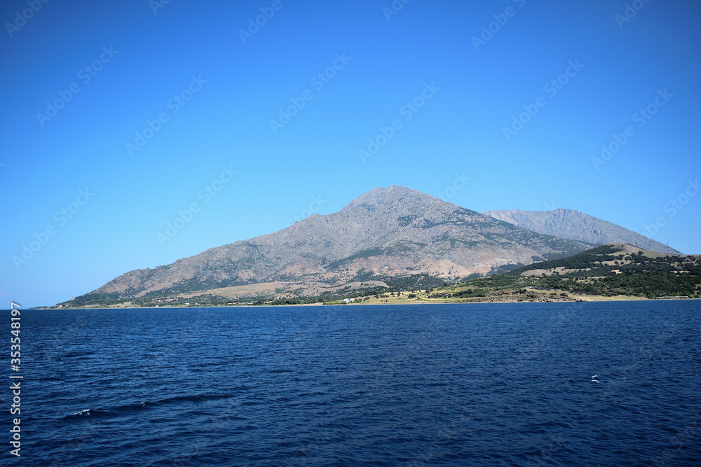 Seascape with Saos mountain and coastline - Samothraki island view from ferry - Greece, Aegean sea