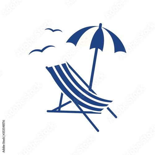 Beach parasol and lounge chair