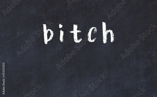 Black chalkboard with inscription bitch on in