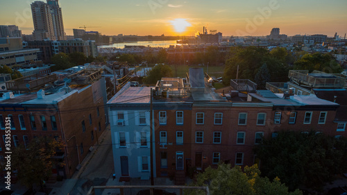 Aerial of the sunrise over the Federal Hill neighborhood in Baltimore, Maryland. photo