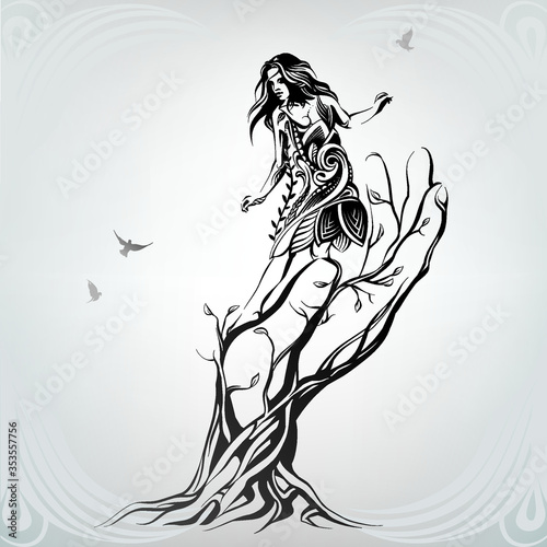 Girl in a dress on a tree